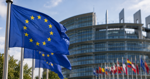 European Union flags outside an EU institutional building in Brussels.