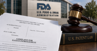 Patent documents and a court filing arranged on a desk with a federal courthouse blurred in the background