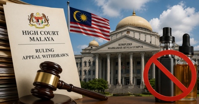 Malaysian government documents and a gavel beside a map of Malaysia
