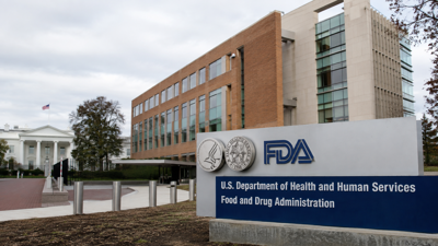 FDA headquarters with the White House visible in a Washington government-themed news montage