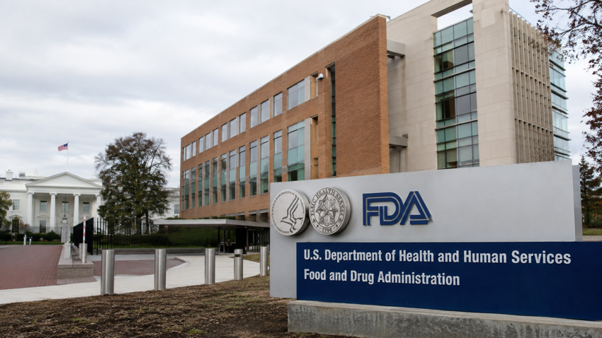 FDA headquarters with the White House visible in a Washington government-themed news montage